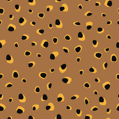 Trendy seamless pattern of yellow brown leopard spots for holiday wrapping paper, fabric, textile, bedding, bedspread. 