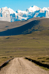 Tibet snow mountain and road