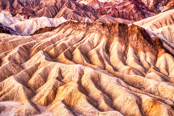 Badlands view from Zabriskie Point in Death Valley National Park at Sunset, California