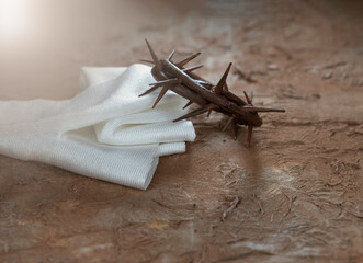 He is risen.
Crown of thorns on background with copy space for inscription. Jesus Christ Resurrection. Christian easter concept.