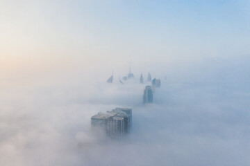 Dubai city skyline in dense fog