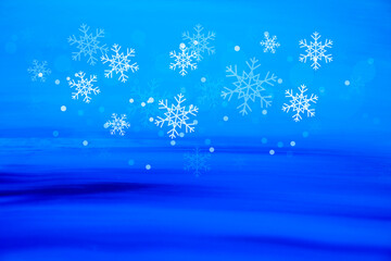 Naklejka na ściany i meble Abstract blue winter background with falling snowflakes stock images. Winter blue snowy background images. Snowflakes isolated on a blue background