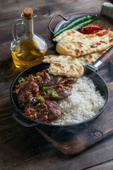 pakistani indian food - lamb with rice and flat bread