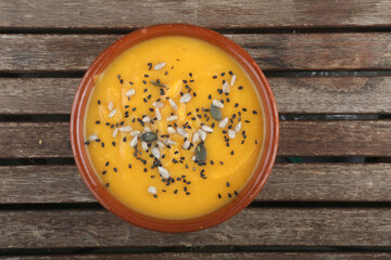 pumpkin hot cream soup as vegan healthy food