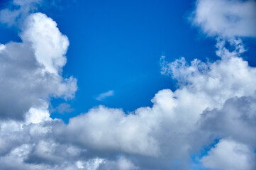 Naklejka na ściany i meble white clouds cotton effect and blue sky
