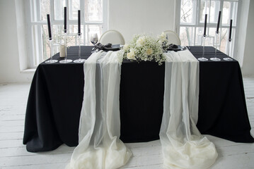 Wedding decorations. Candles. Wedding table decoration with flowers. Wedding decor