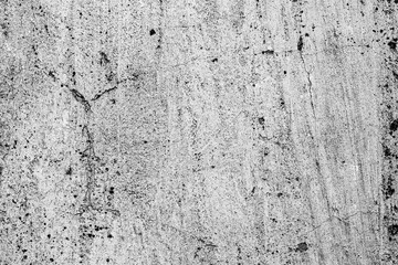 Texture of a concrete wall with cracks and scratches which can be used as a background