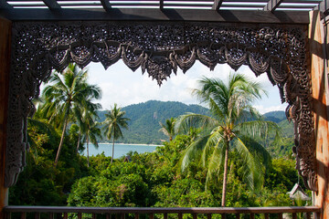 views of the ocean and palm trees Thailand