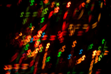 Fototapeta na wymiar Financial background with multicolored bokeh in the form of dollar
