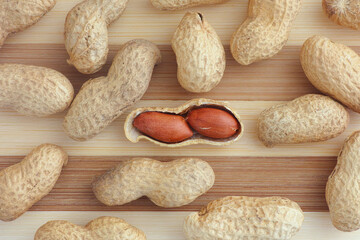 Peanuts on a wooden background