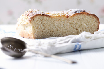 Simple yeast cake on bright background.	Close up. 