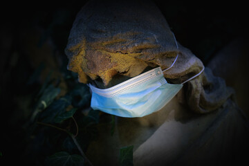 Angels also wear medical masks. Coronavirus, air pollution pm2.5, and quarantine concept. Beautiful...