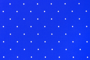 Blue seamless texture with white polka dots abstract pattern background © Andrey