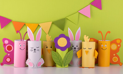 handmade toilet paper roll toys for children, bunnies butterflies birds. needlework is a craft made of paper