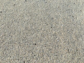 Fototapeta na wymiar Photo of sand on the beach texture for backgrounds