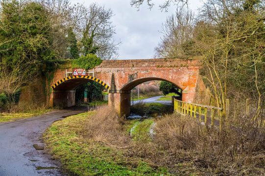 The disused railway bridge at Lubenham, UK in winter