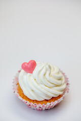 Homemade muffins for Valentine's Day. Photo 6: The finished dessert is decorated with cream and hearts.