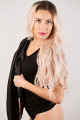 Fototapeta premium long-haired, blonde woman in a black jacket