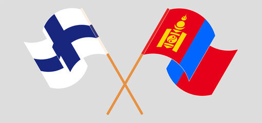 Crossed and waving flags of Finland and Mongolia