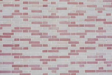 Beautiful even brick wall , big wall with red, grey and bright bricks, no person and space for text, background fror a template