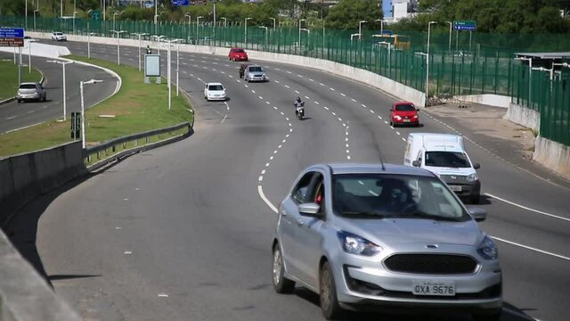 salvador, bahia, brazil - january 18, 2021: movement of vehicles on a road near the Salvador International Airport.