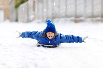 Fototapeta na wymiar happy girl in snowtime