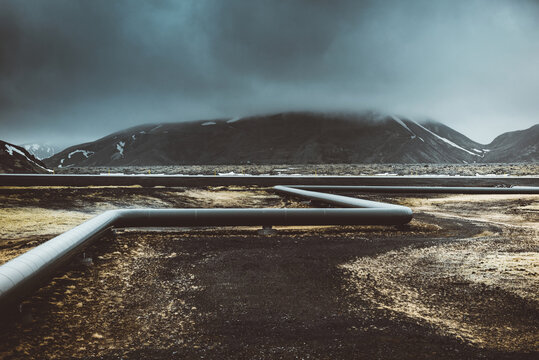Beautiful landscape in Iceland in a moody atmosphere with ecological gas pipes. Icelandic geothermal ecology and landscape.