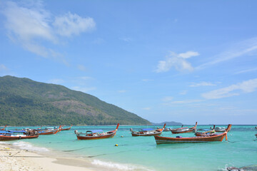 Fototapeta na wymiar boats on the beach on Koh Lipe island in Thailand