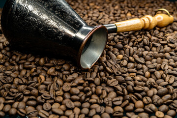 coffee turk among roasted coffee beans
