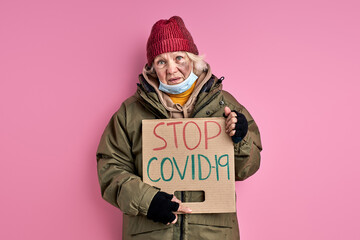 bum woman want coronavirus to be stopped, she lost her job and home due to covid-19, isolated pink...