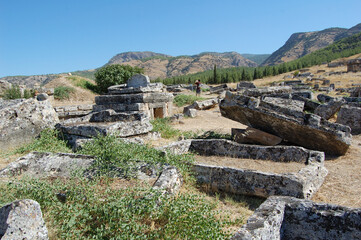 Fototapeta na wymiar Ancient Roman ruins of Hierapolis (Anatolia, Turkey). Next to the natural hot springs of Pamukkale. Necropolis. Tombs 