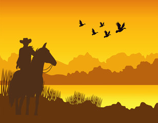 wild west sunset desert scene with cowboy in horse and gulls flying