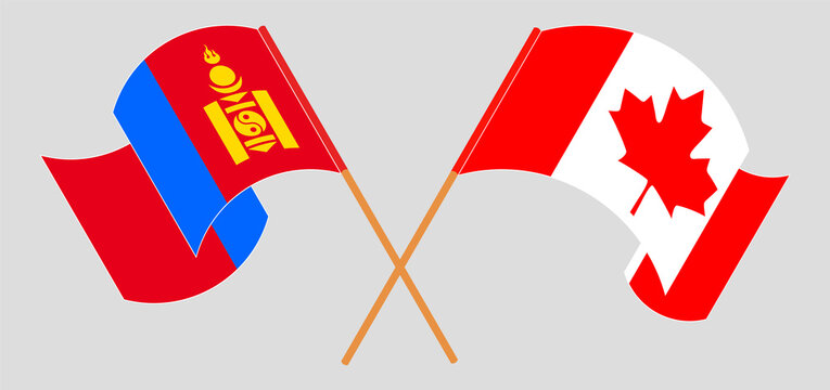 Crossed and waving flags of Mongolia and Canada