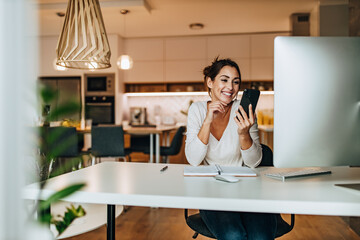 Taking some notes, having video call.