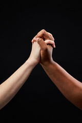 hands holding each other, hand symbol isolated on black background. people diversity, tolerance, love, relationships concept