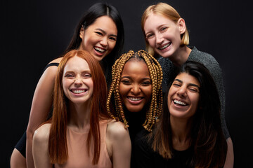 joyful smiling diverse ladies posing at camera isolated in studio, natural beauty, tolerance concept