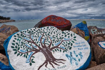 Scenes from V Wall at Nambucca Heads, of various graffiti in remembrance of people, as a public display.