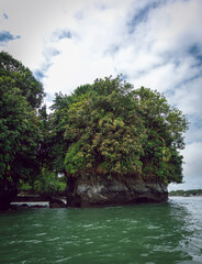 Fototapeta na wymiar Image of a island and cliff in Juanchaco, Buenaventura, Valle del Cauca, Colombia. National natural park Uramba.