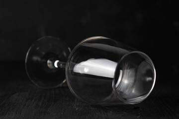 shape of wine glass folded on black background