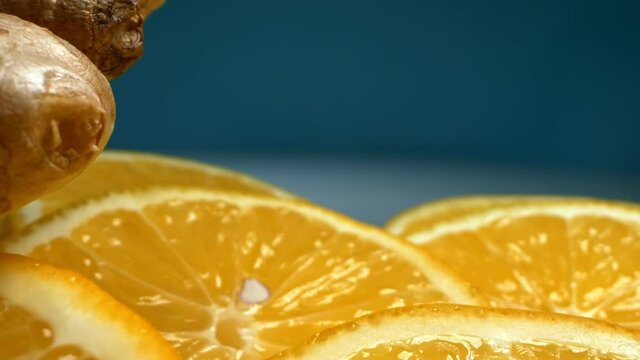  extremely close-up, detailed. slices of juicy lemon and ginger root.