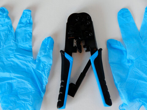 clipper for thurst internet wires and protective gloves