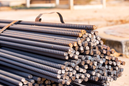 Reinforcement steel rod and deformed bar with rebar at construction site.
