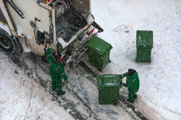 household waste collection in winter snowy weather