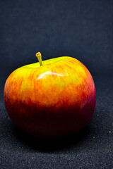 apple on a black background isolated