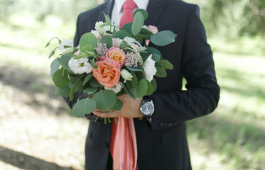 Wedding bouquet and man.
