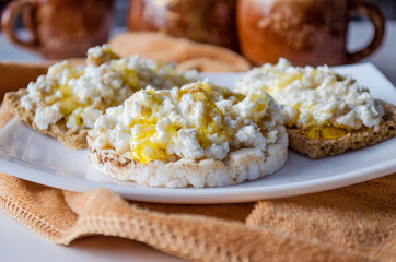 breakfast of bread with cottage cheese and honey