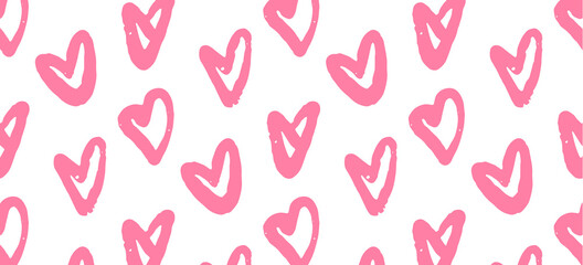seamless pattern with pink hearts.

Pink hearts are arranged diagonally on a white background, close-up side view.