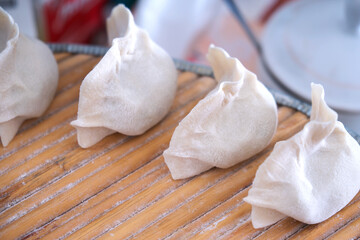 Fototapeta na wymiar Steamed dumplings with white flour