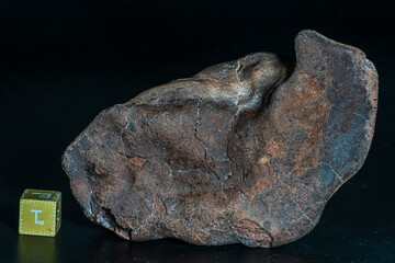 Chondrite Meteorite isolated, piece of rock formed as an asteroid in the universe at during Solar System creation. The meteorite comes from an asteroid fall impacting Earth at Atacama Desert © abriendomundo