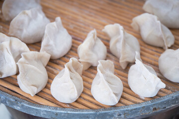 Fototapeta na wymiar Chinese custom of making dumplings